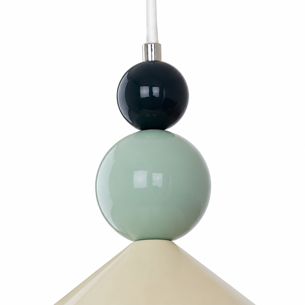 Close-up product detail of the cone pendant lamp shade and colored sphere accents