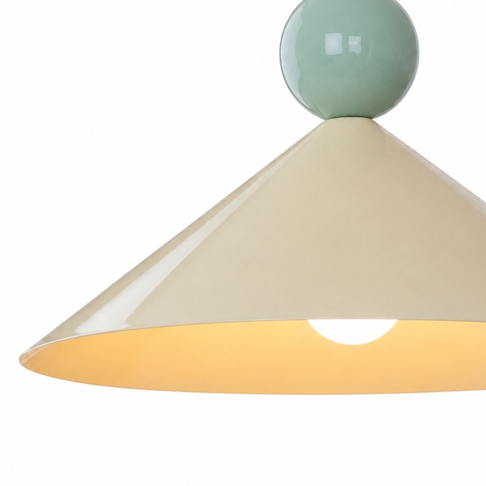 Warm underside light detail on the pendant lamp