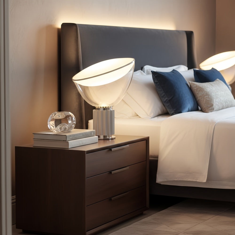 Cuvora Silver table lamp on a bedside chest
